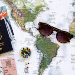 Traveling - brown framed sunglasses on map