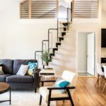 Living Space - gray sofa beside white wall