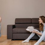 Quality Childcare - A Woman Sitting on the Floor