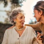 Low-Maintenance Garden - Joyful adult daughter greeting happy surprised senior mother in garden