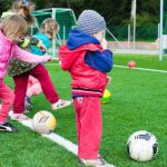 Kids' Sports - Toddler Playing Soccer