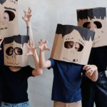 Parents DIY - A Family Wearing a Diy Cardboard Box Mask