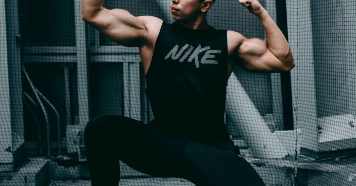 Gym Memberships - Man in Black Tank Top and Black Pants Doing Yoga
